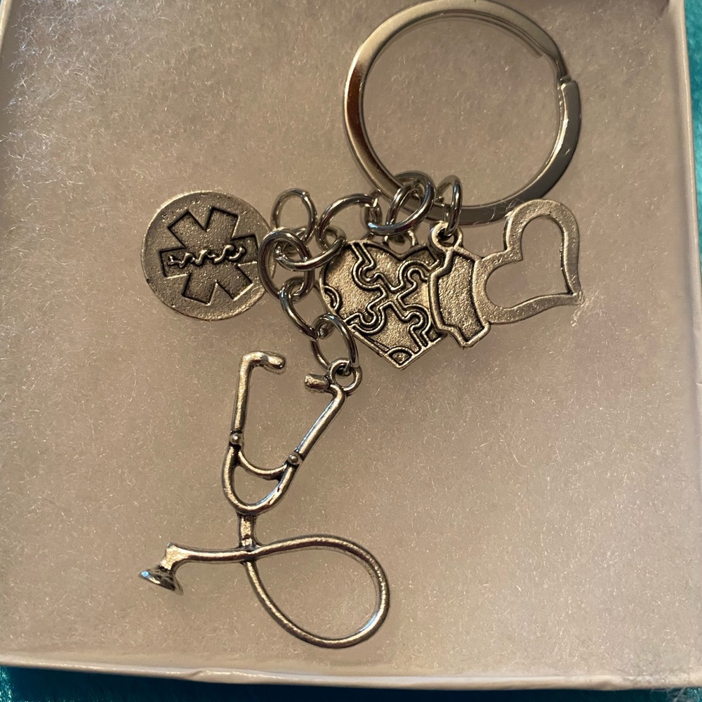 Nurse key or purse charm. NWT
